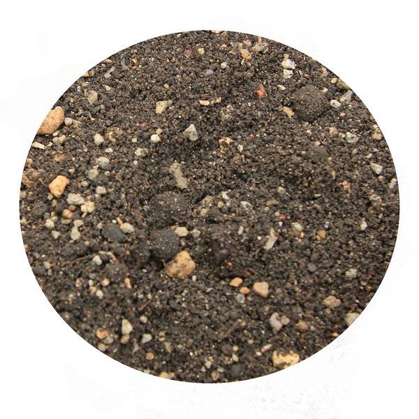 Close-up of Aquascape Pond Plant Potting Media in a container, showing the textured organic material for aquatic plant growth.