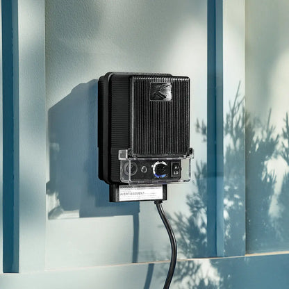 Kichler Economy landscape transformer in black, designed for outdoor lighting, with a compact, weather-resistant build.