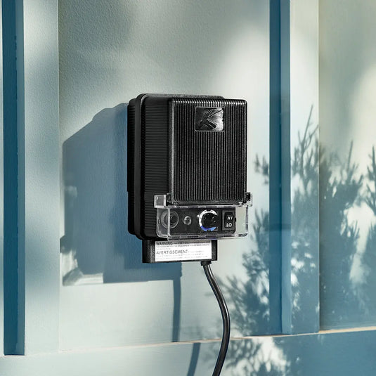 Kichler Economy landscape transformer in black, designed for outdoor lighting, with a compact, weather-resistant build.