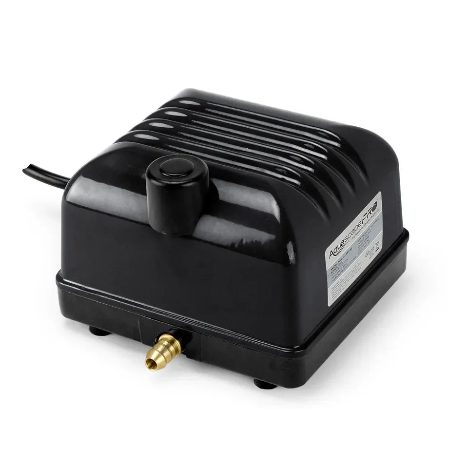 Aquascape Pro Air 20 pond aeration compressor with air tubing and diffuser for oxygenating pond water.