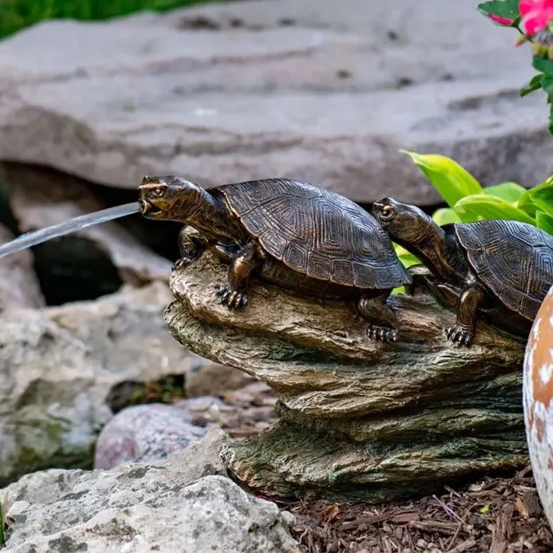 Aquascape double turtle on a log spitter decorative feature for pond or aquarium, with two turtles perched on a log.