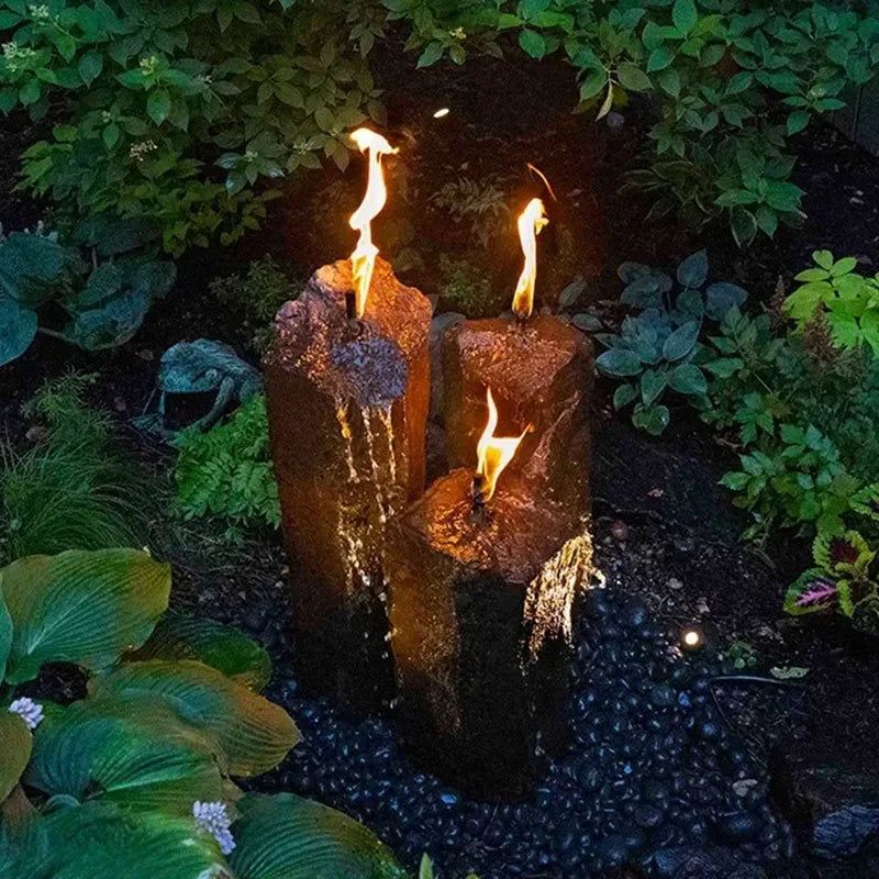 Aquascape Fire and Water 3-piece Basalt Torch System decorative feature with basalt torches and water elements for outdoor ambiance.