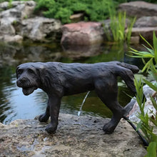 Decorative Aquascape Naughty Dog Spitter feature with dog sculpture and water spouting, ideal for garden or pond decoration.