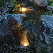Aquascape Medium Deluxe Pondless Waterfall Kit with 16-foot stream and Aquasurge 2000-4000 adjustable flow pond pump.