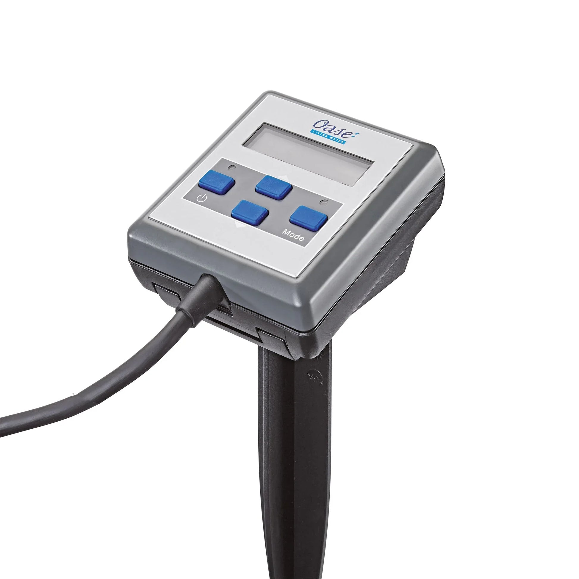 Oase Eco Control US installation equipment, showing connectors and control unit for pond and water feature management.